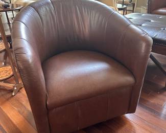Pair brown leather swivel chairs