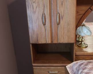 one  of  two  cabinets  with  drawers  below  It  is  24"  wide  x  17"  deep.