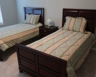 two  twin  beds  with head  and  foot boards