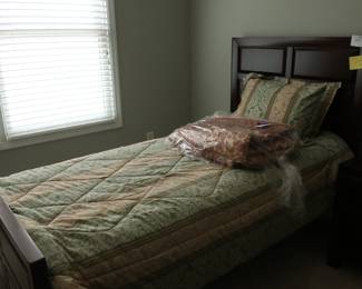 one  of  two  twin  beds,  spreads
