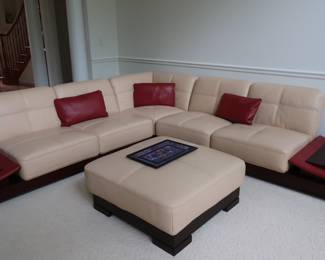 3  piece cream  color  faux leather sofa  and coffee  table.  The sectional  is three  pieces.  The  end  pieces  are  connected.    First  two   section  is  118  x  38 (2  pcs) and  the other  piece  is  84"  x  38". The  table  is  34"  x  34".