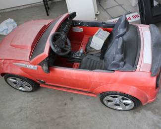 mustang battery operated child's car, needs  work