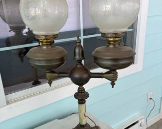 Gas lamp made electric.