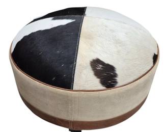3434 - Cowhide with Leather Trim Ottoman 19 tall on outside edge (taller in middle) x 39 diameter
