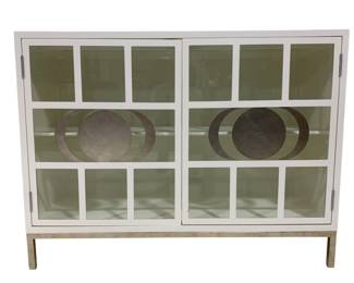 1526 - Chelsea House Ficino White Bookcase 36" x 48" x 18" Retail $3770 An excellent use for storage that doesn't take up a lot of room, the Ficino Bookshelf is perfect for those who need style with a statement. Finished in white with a metal frame, the moon phase detailing on the windowpane glass doors adds an enduring touch to a polished look. Designed by Lisa Kahn.