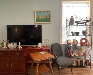 SAMSUNG TV, ETHAN ALLEN ROLLING BUFFET SERVER, ANTIQUE GLASS CLAW FOOT ACCENT TABLE, ACCENT CHAIR, WROUGHT IRON SHELF