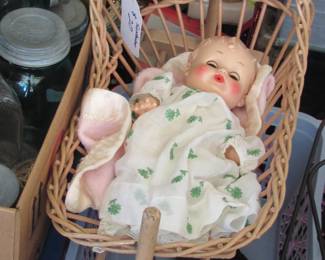 doll and nice vine cradle 