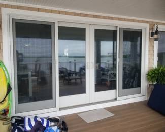 Nearly new sliding glass doors. One 12 ft. unit and 3 6 ft. units available
