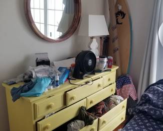 Wall mirror; yellow dresser