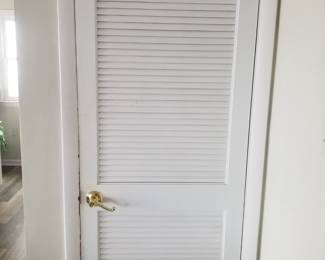 Louvered door