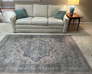 Ethan Allen feather blend sofa, area rug, side table, lamp