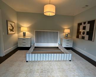 Technosedia custom nautical stripe and leather king size bed on an oushak rug