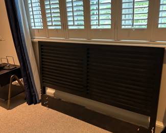 This picture isn’t great.  It’s a Room and Board “MORO” adjustable full or queen size bed with a slay style headboard. 