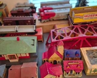 3 tables of Lionel trains and accessories from pre and post WWII