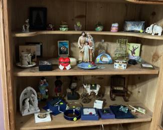 Curios in cabinet, Swiss clock, trinket boxes, smalls, Krewe favors