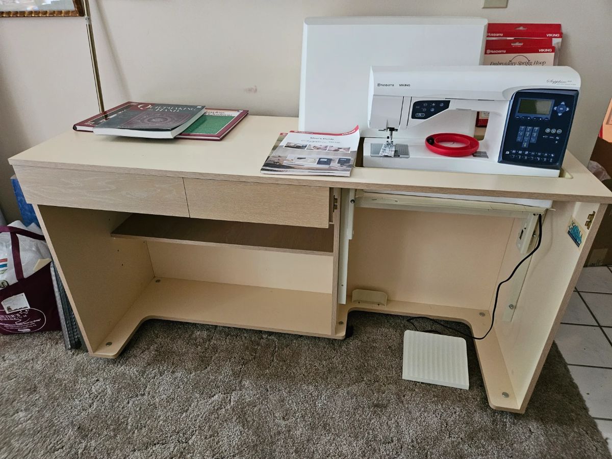 Very nice sewing table.  The back swings out creating twice the space (detached at this time)