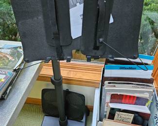 Levo book and tablet stand