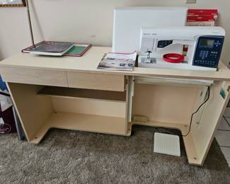 Very nice sewing table.  The back swings out creating twice the space (detached at this time)