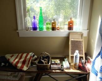 Colored bottles, , Chenile bed spread, old wood ironing board ,