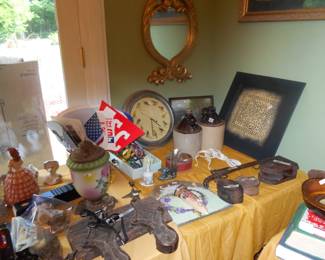 old pulleys, lamps, clocks, crock jugs, gold mirror