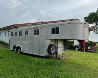 $8k Awesome sooner horse trailer… Carries four horses and has a weekender package up front including a high sleeping bunkhouse and a low changing/tack room plus has saddle storage on the back left of the rearcabd 4 partitioned horse stalls. Really great aluminum Sooner trailer! Perfect for just getting into showing or competitive riding!