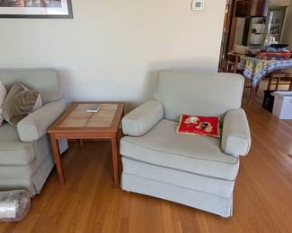 Stuffed arm chair and couch in excellent condition Made in Denmark Tile top and teak side table