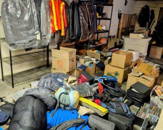Lots of camping gear including tents and sleeping bags