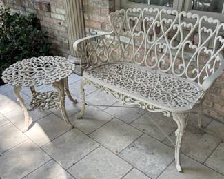 Pair of Cast Outdoor Benches and Table