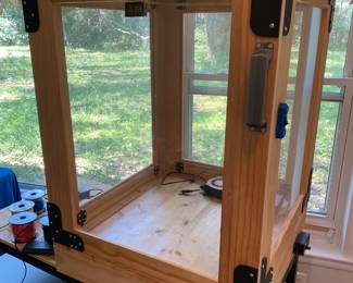 Cabinet included with 3D Printer.