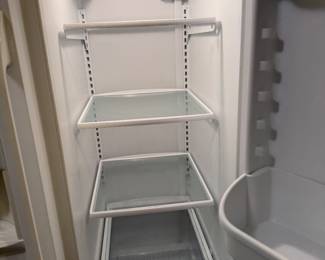 Frigidaire side-by-side refrigerator/freezer with ice-maker and water dispenser