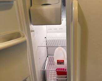 Frigidaire side-by-side refrigerator/freezer with ice-maker and water dispenser
