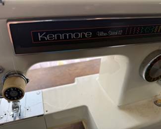 Kenmore Ultra stitch 12 sewing machine/model 15611 AND sewing machine cabinet
