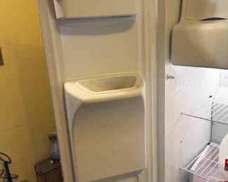 Frigidaire side-by-side refrigerator/freezer with ice-maker and water dispenser