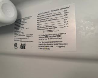 Frigidaire side-by-side refrigerator/freezer with ice-maker and water dispenser