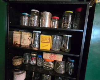 Screws, nuts, Gerber baby food jars 