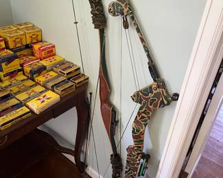 Bear Archery recurve bow; compound bow.