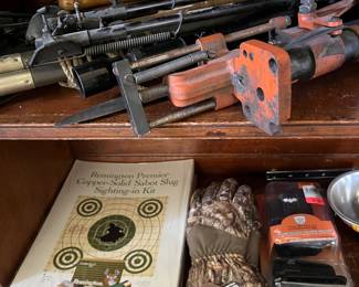 Many hunting and shooting accessories to be sold, including a number of hand traps/skeet throwers, rifle bipods, and more.