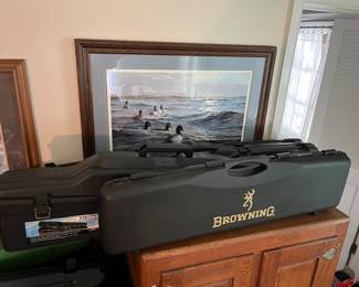 Numerous gun guards/cases, many vintage, by Doskocil, Browning, Plano, and others.