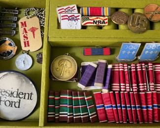 WWII military metals, pins, and bars.