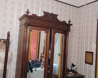 580. LARGE MIRRORED ARMOIRE $525