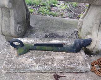 1. CAST IRON BOOT SCAPER IN CONCRETE $85.
