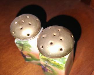 48. SALT AND PEPPER SHAKERS $12