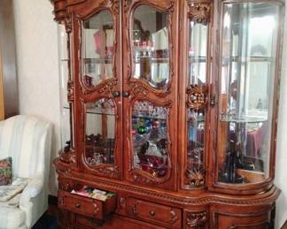 519. LARGE DISPLAY CABINET MAGHONY COLOR. $750. 