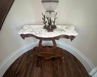Antique hall table with crystal accent piece