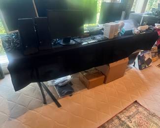 So many monitors and computer accessories