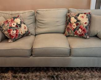 Century sofa. Soft green fabric.