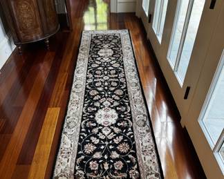 Black and ivory wool runner with backing, 2'3" x 8"