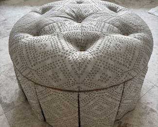 Round tufted upholstered ottoman
