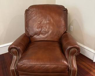 One of two Hancock & Moore leather recliners