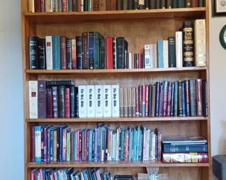 Religious books, Bibles and Hickory Truckers caps.